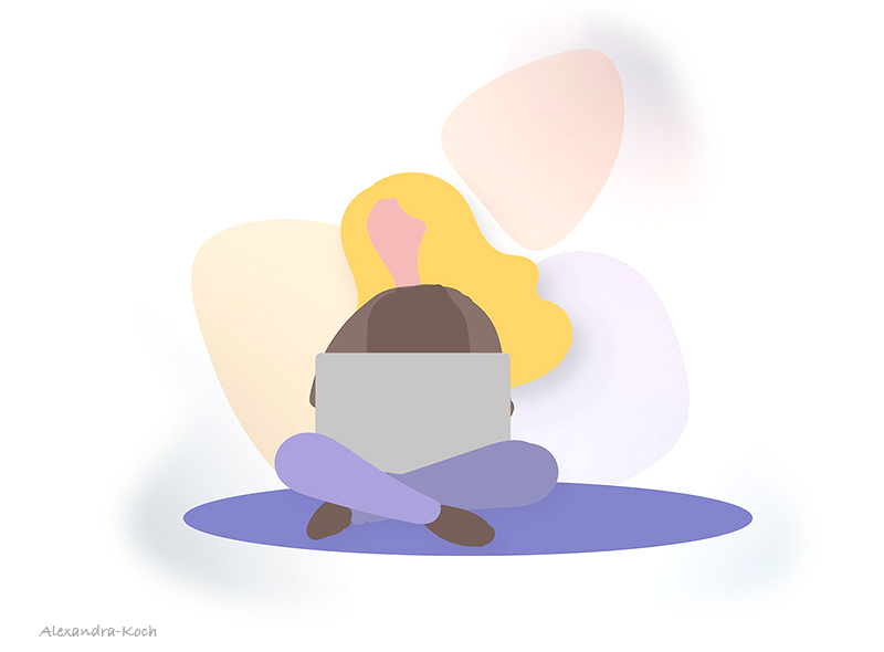 Girl working on a laptop while sitting on the floor.